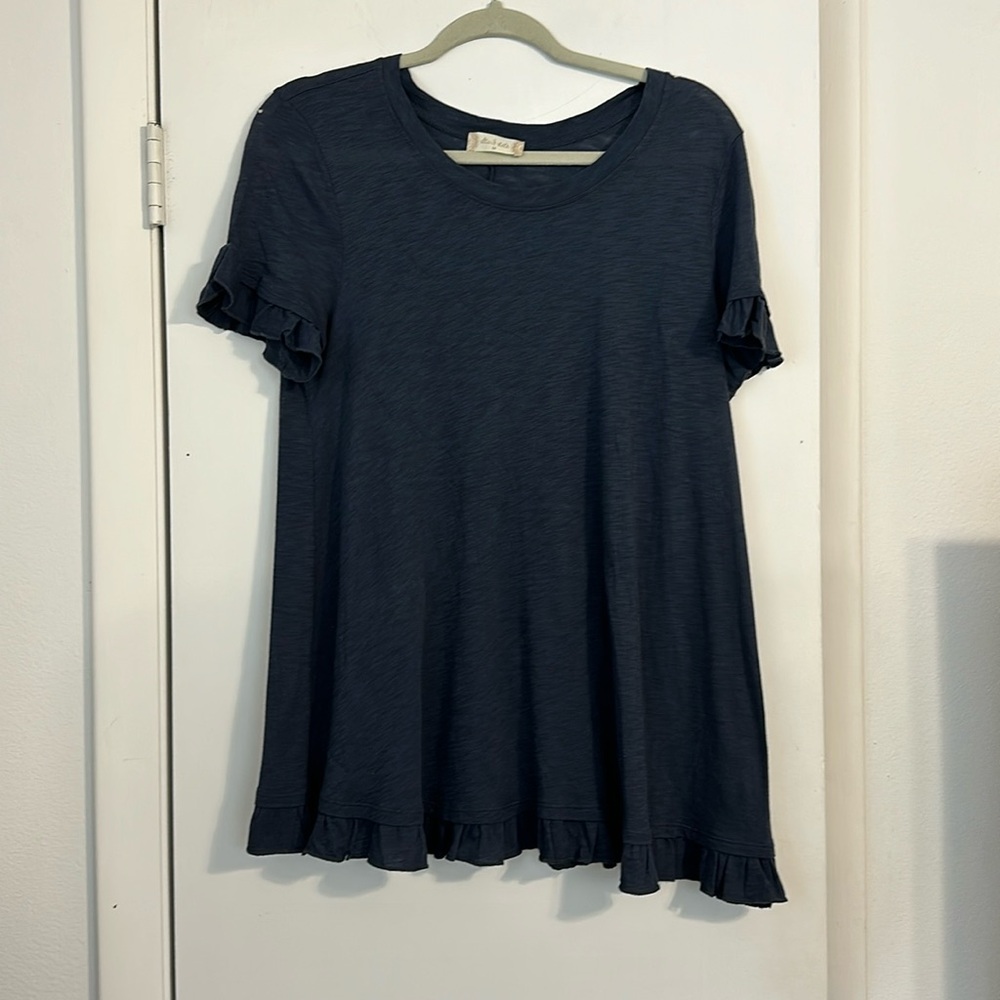 Altar’d State navy blue short sleeve shirt with ruffle detail on bottom & sleeve